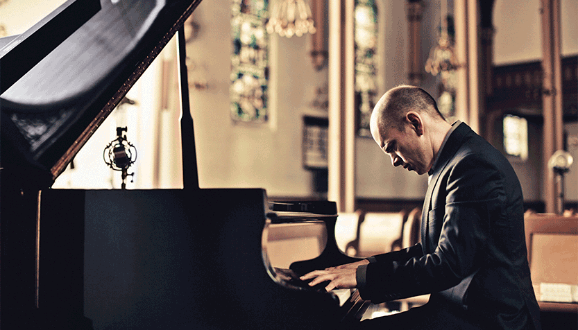 Tord Gustavsen Playing A Grand Piano With The Lid Up