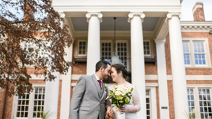 Bride And Groom On The Mansion Portico Weddings