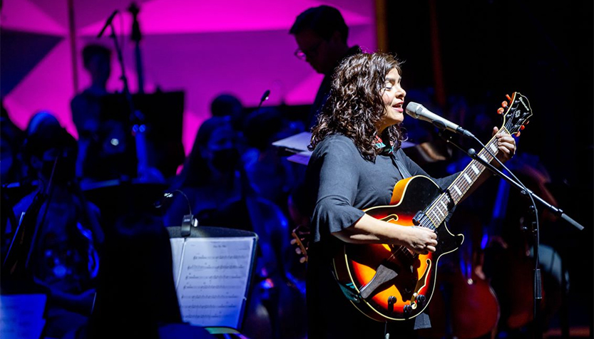 Luca Mundaca Performing With Guitar And Orchestra