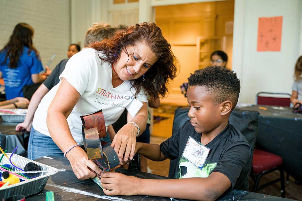 Instructors With Students At Art Camp