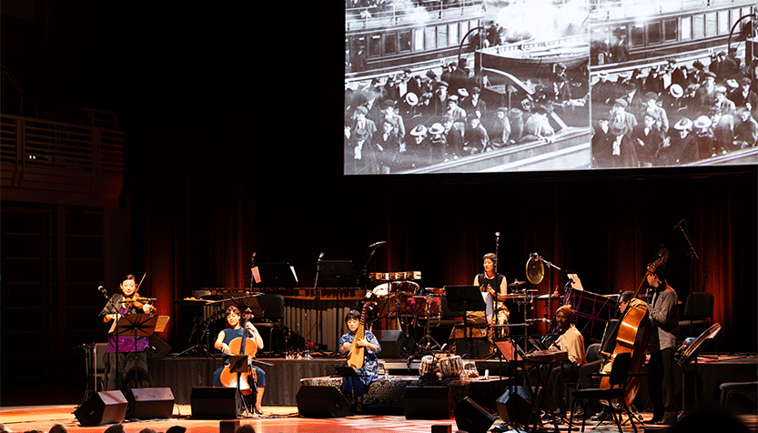 Silkroad Ensemble American Railroad Orchestra Performance In Front Of Screen
