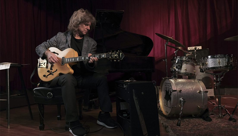 Pat Metheny With Guitar And Drum Kit