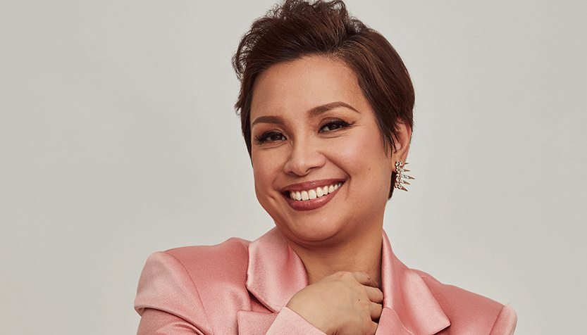 Lea Salonga Smiling In A Pink Silk Blouse