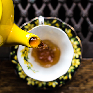 Tea Pouring In Cup