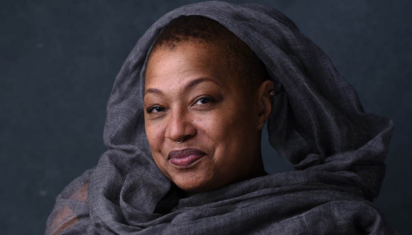 Singer Lisa Fischer wearing a scarf over her head