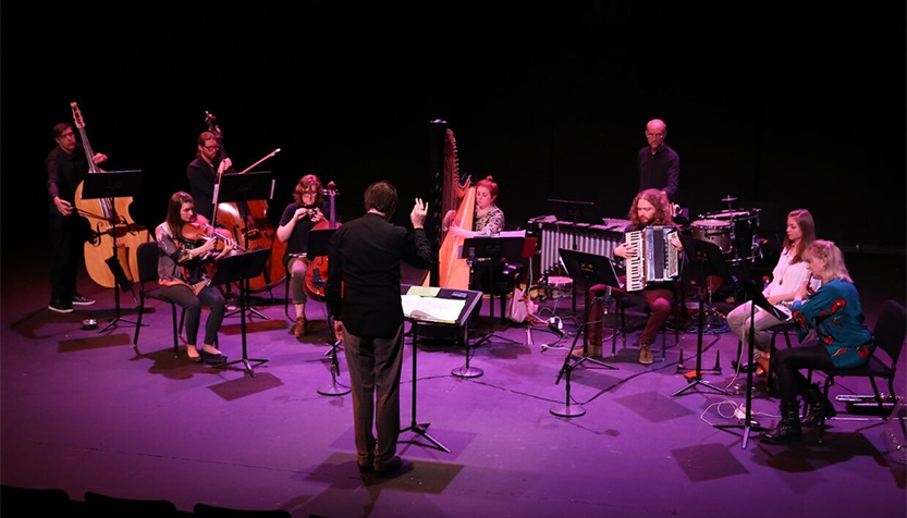 Ghost Ensemble Performing On Stage