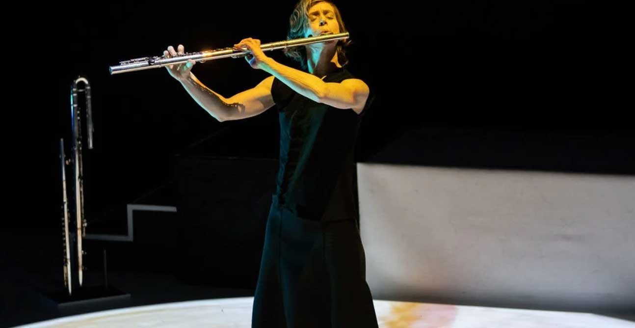 Claire Chase In A Black Dress Playing The Flute