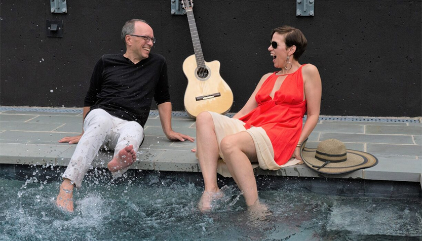 Veronneau Splashing By The Pool With Guitar In Background