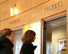 Woman At Ticket Office Window 280X224