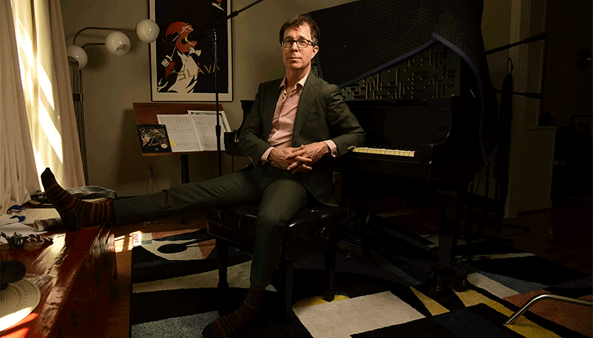 Ben Folds Sitting In A Music Studio Near A Piano