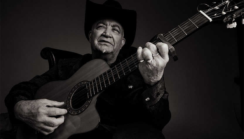 Eliades Ochoa Black And White Portrait With Black Hat And Guitar