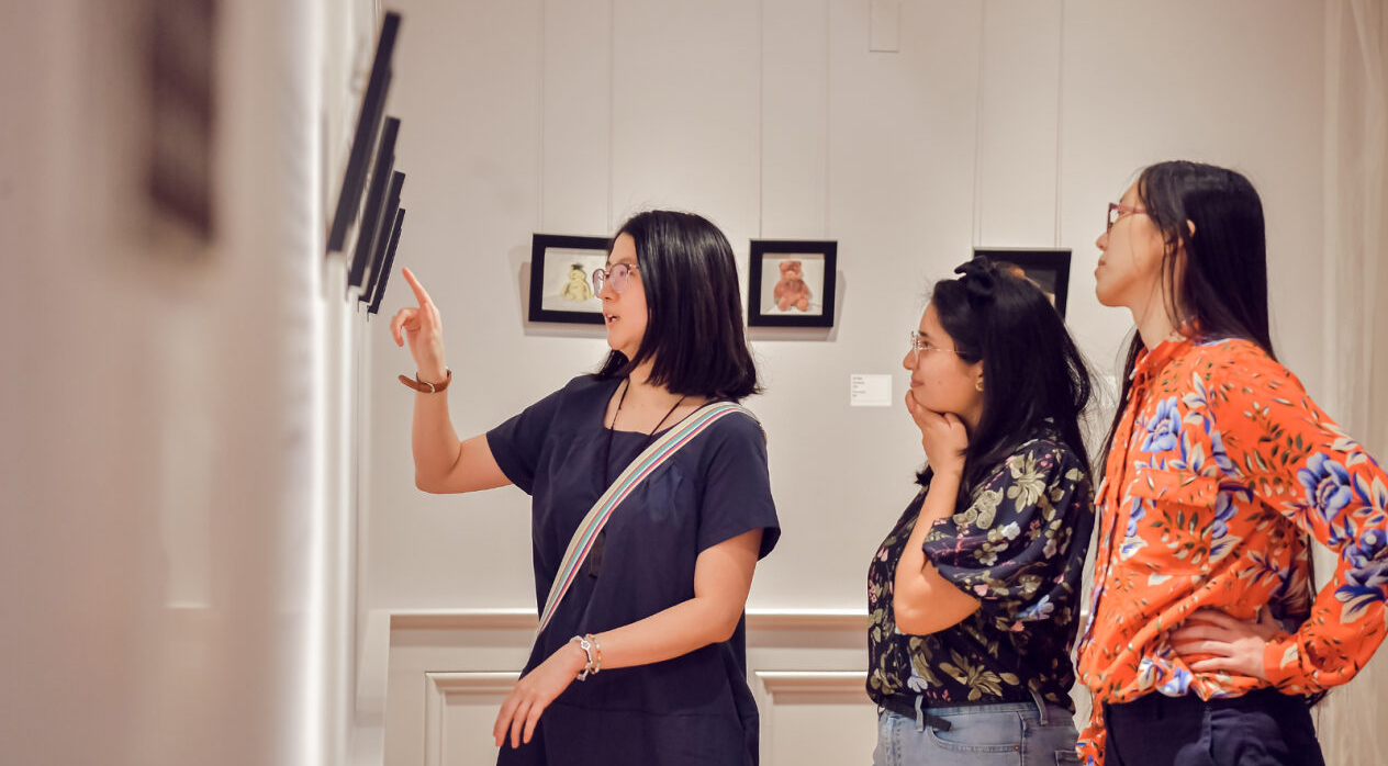 Ladies Looking At Art In The Galleries